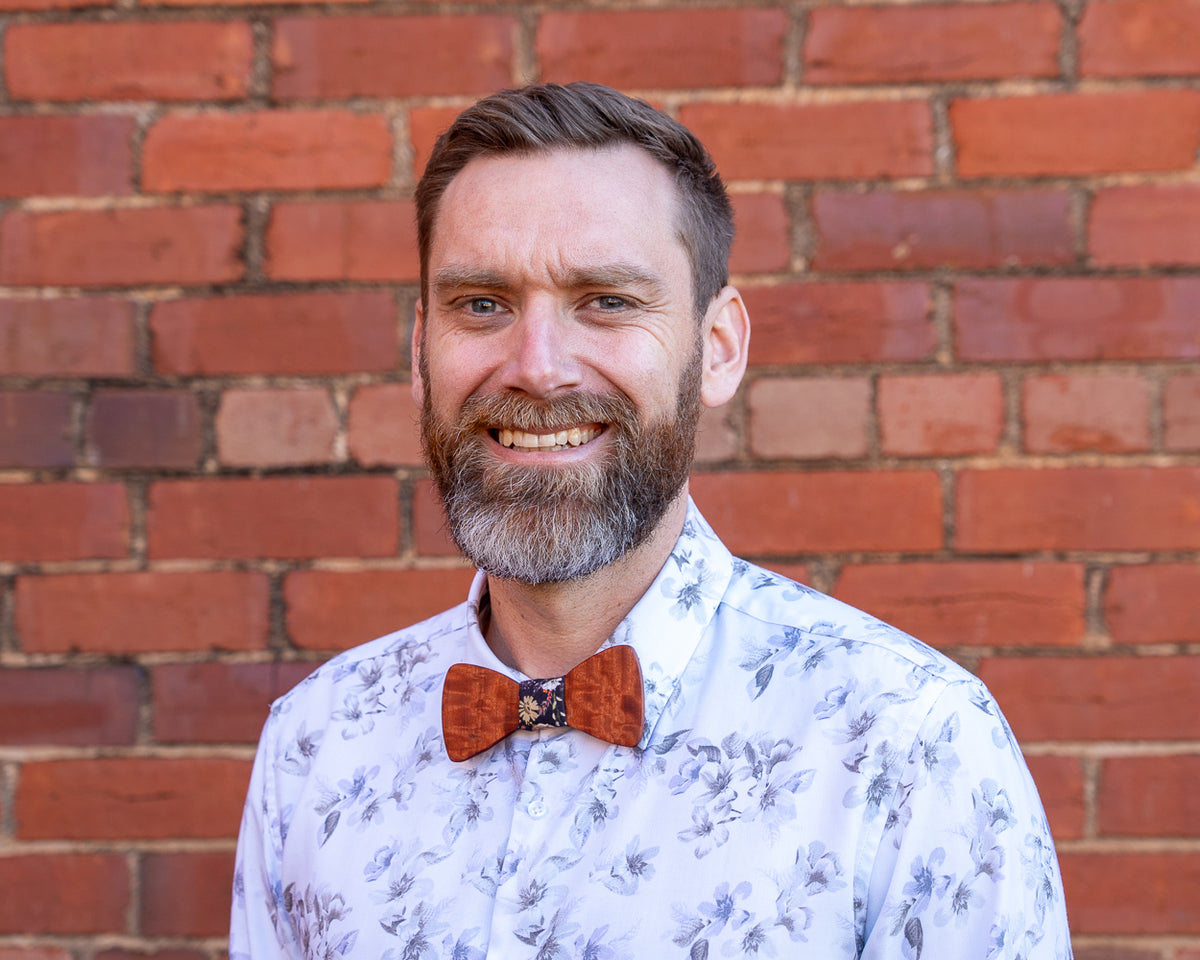 Ash wearing a handcrafted Australian hardwood magnetic bowtie